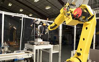 A FANUC robot loads the Equator™ in the automated cell
